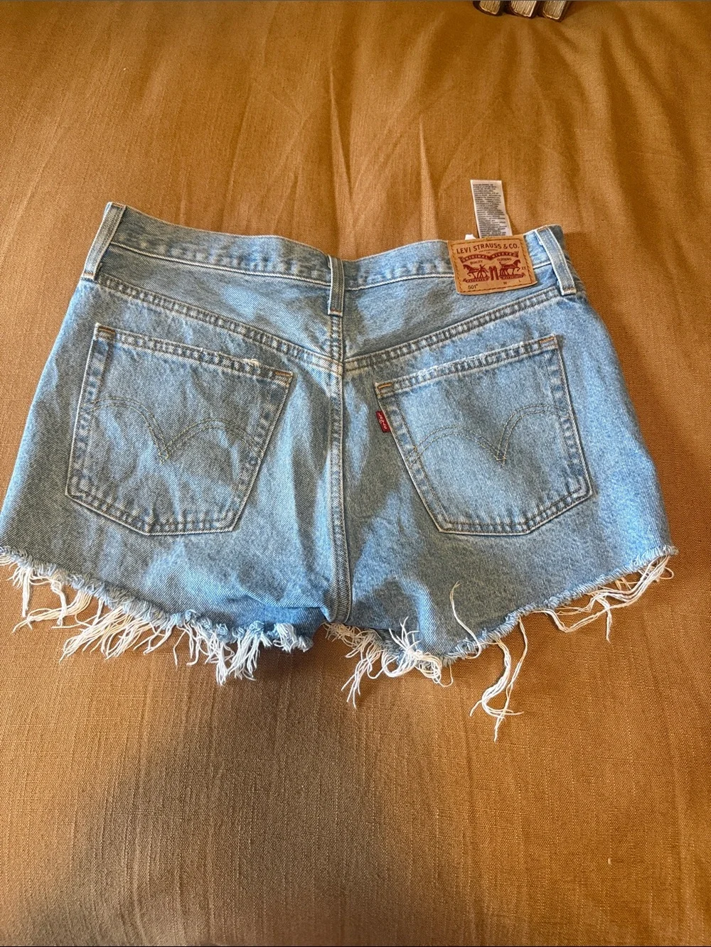 Levi 501 Light Blue Distressed Denim Shorts - Women